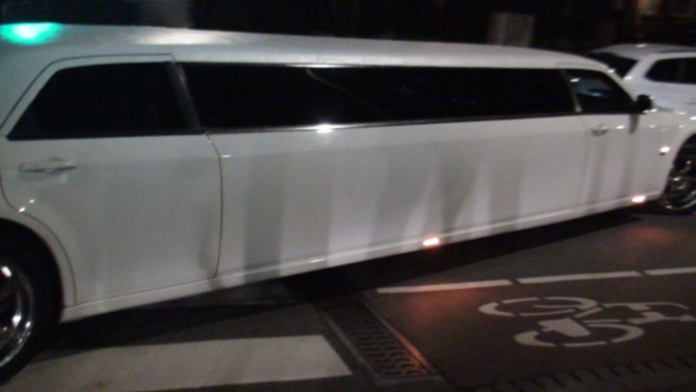 Luxury Limo On The Road In The Night
